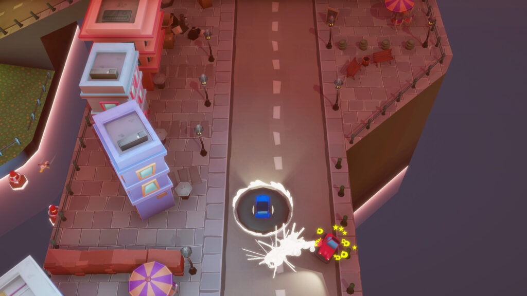 Top-down view of Dashing Dodgems arcade game with colorful cars and obstacles.